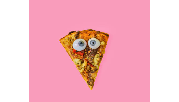 cheesy pizza slice with googly eyes