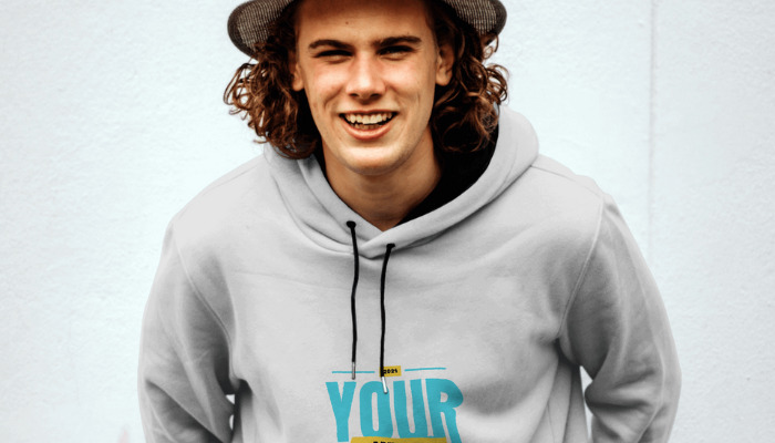 a guy in white hoodie wearing a hat
