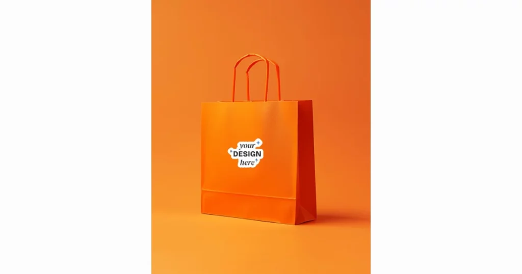 sticker mockup is shown on an orange bag