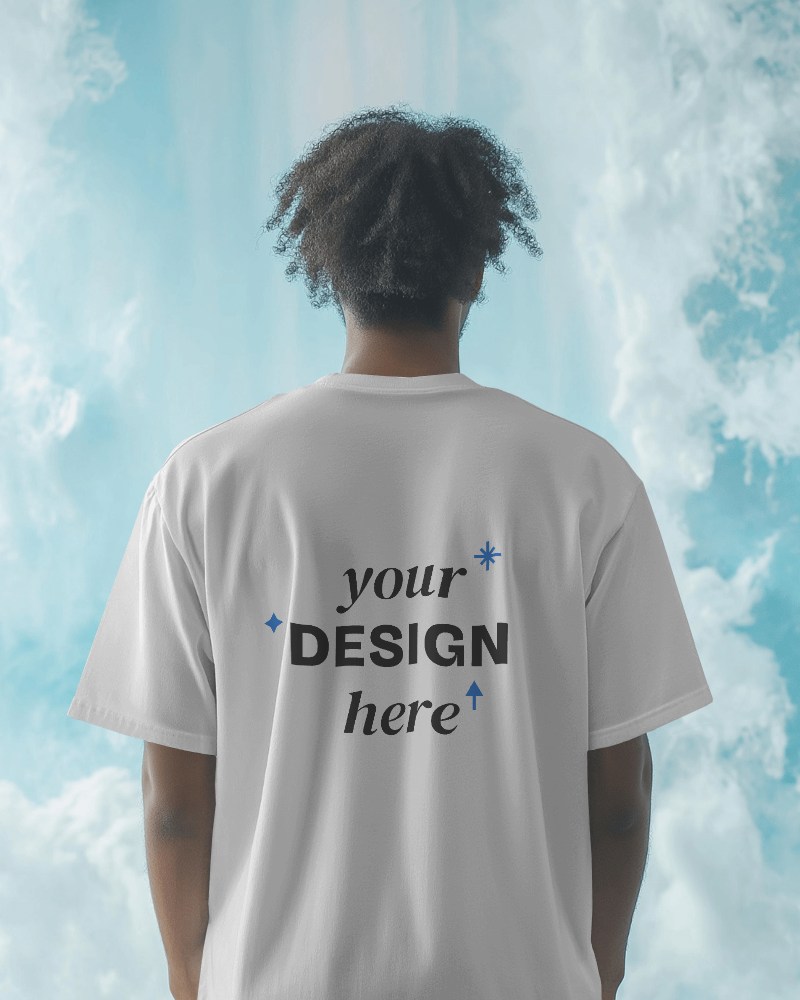 back view-t-shirt-mockup featuring model against cloudy sky background