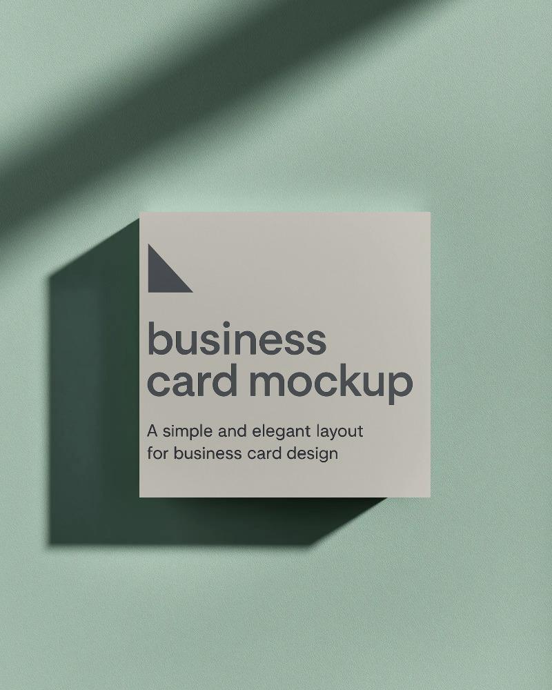 square elevated business card mockup floating on soft mint green textured background with sharp shadow

