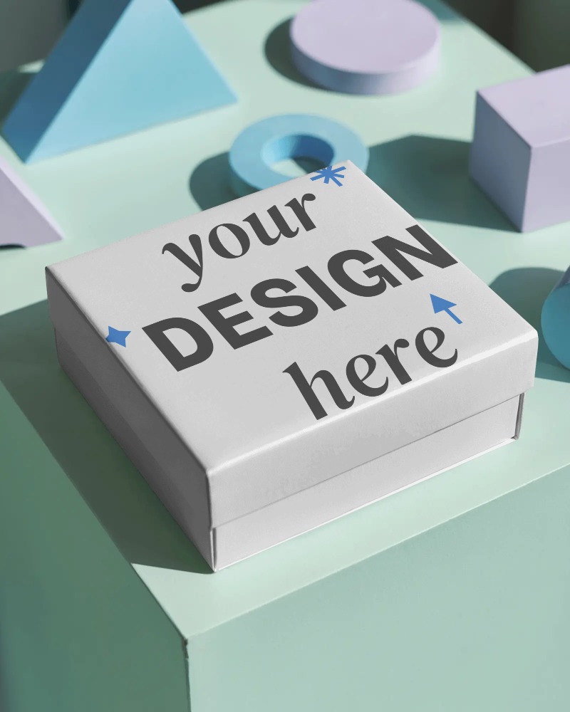 square gift box mockup on pastel green platform with geometric props modern creative scene layout
