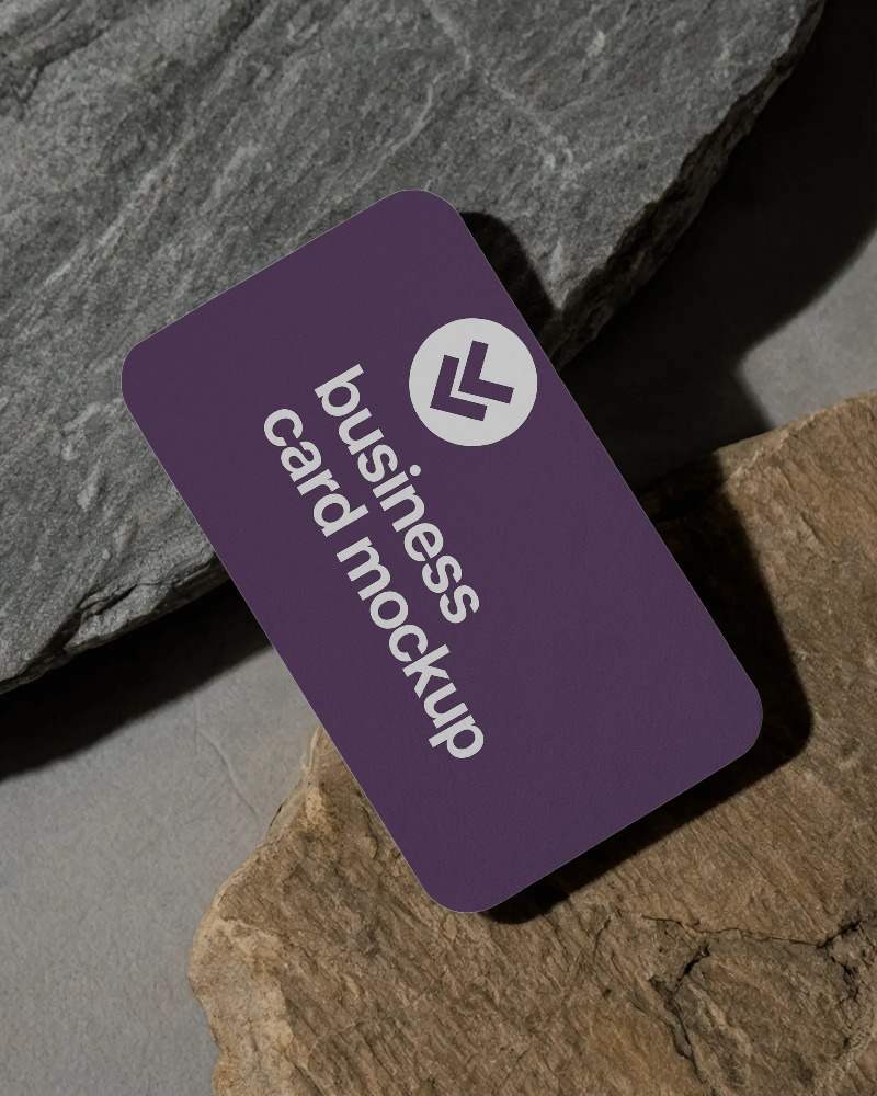 textured stone surface business card mockup with rounded corners and rustic minimal backdrop








