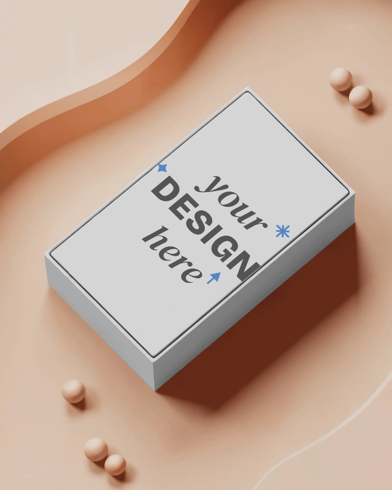 top view rectangular box mockup on peach abstract background with spherical decorative elements








