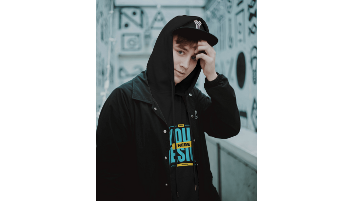 wearing shirt over black hoodie