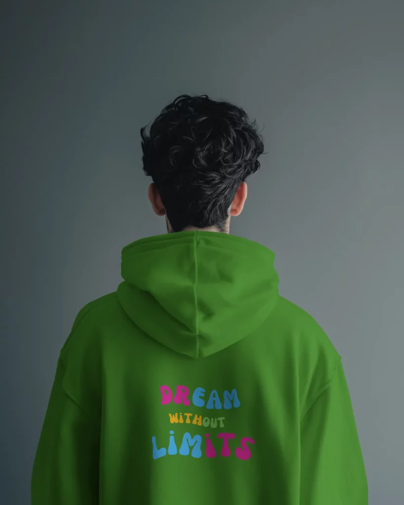 back view of man wearing hoodie mockup in grey studio