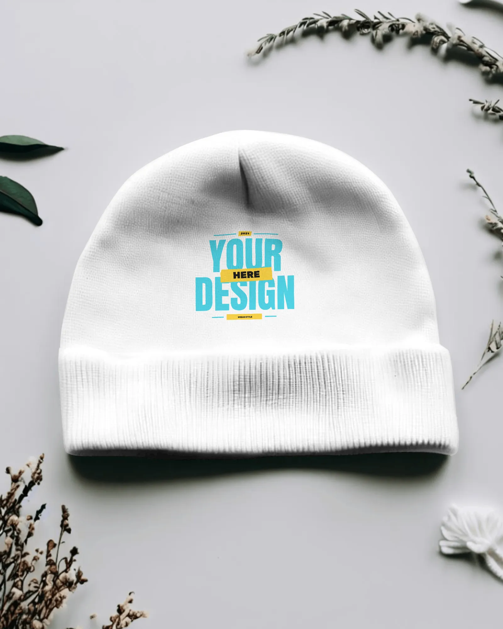 flat beanie mockup having leaves in the background 