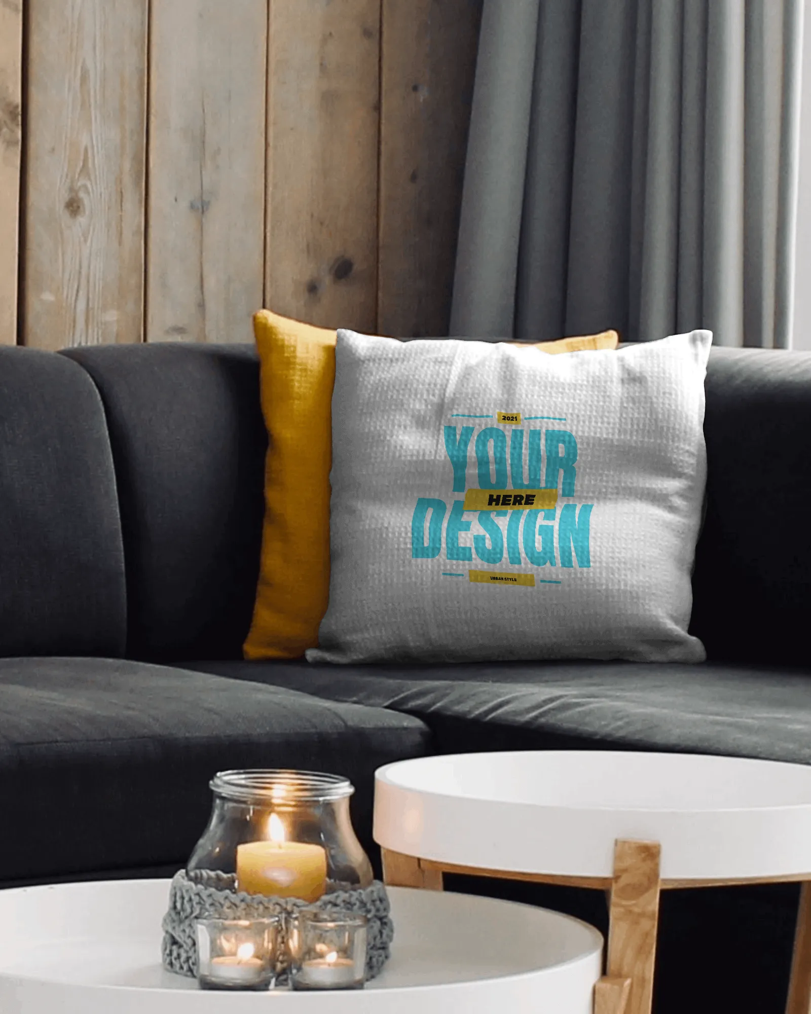 cushion mockup stands in the corner of the sofa.
