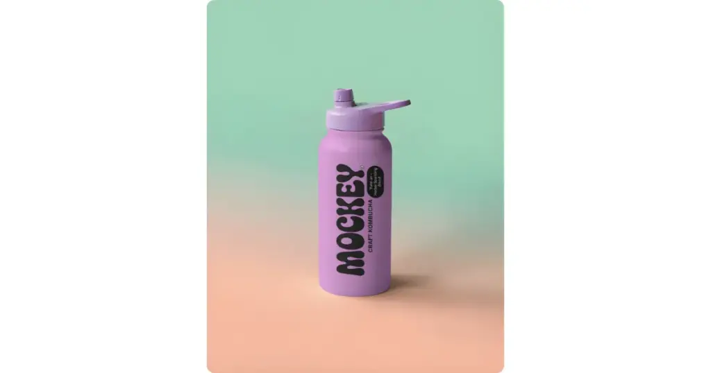 a purple color bottle stands on a gradient background