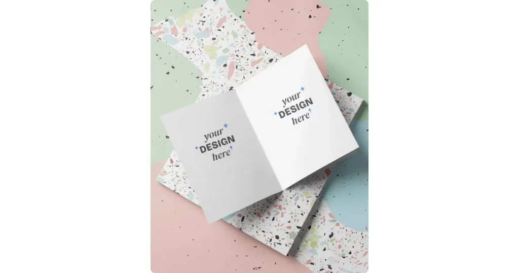 a bi-fold a4 brochure on a terrazzo background