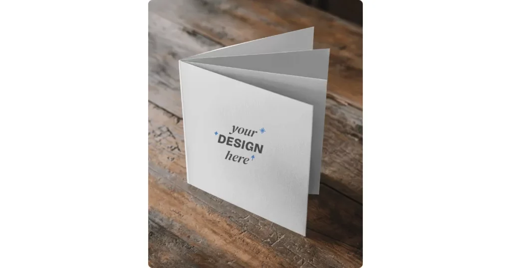 a4 brochure on a wooden table