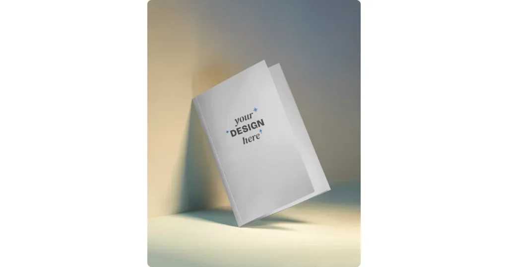 an a4 brochure lean against a wall