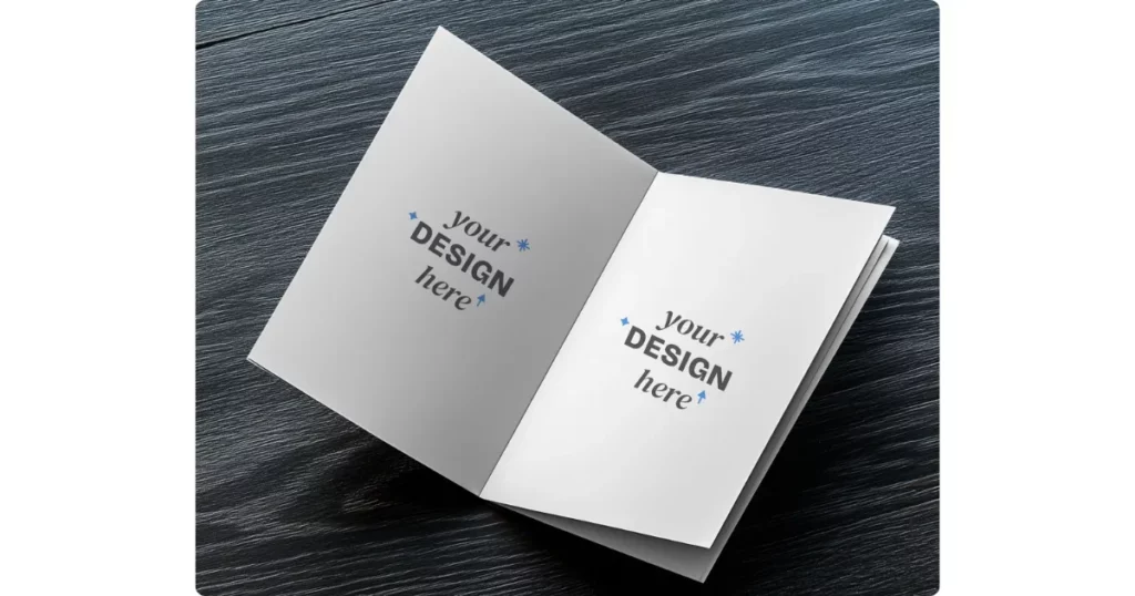 open a4 brochure lying on a dark wooden table