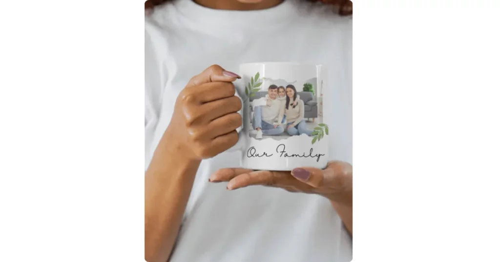 a girl is holding a coffee mug