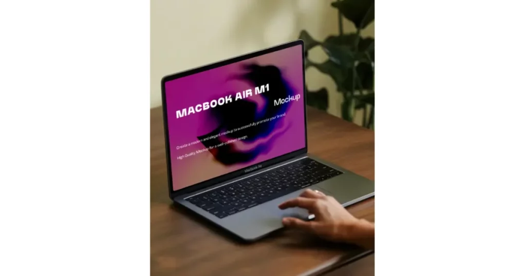 a macbook air m1 on a wooden desk