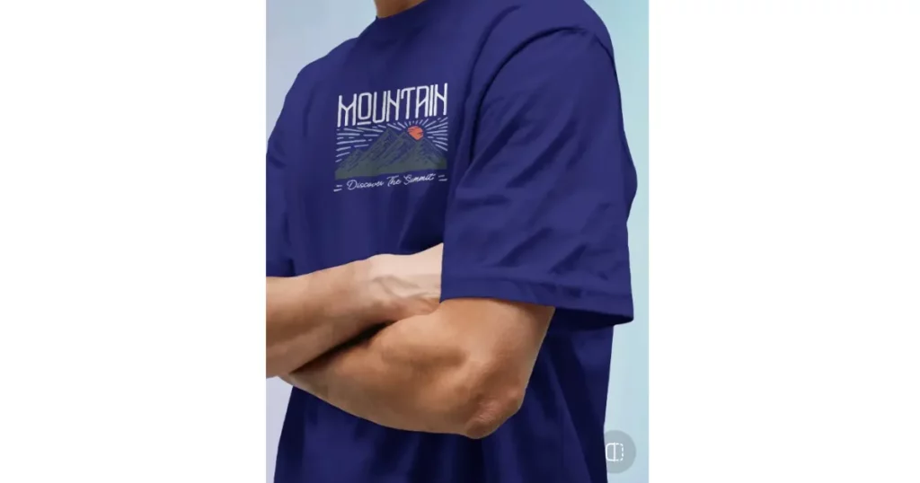 a model wears an oversized t-shirt while crossing his arms