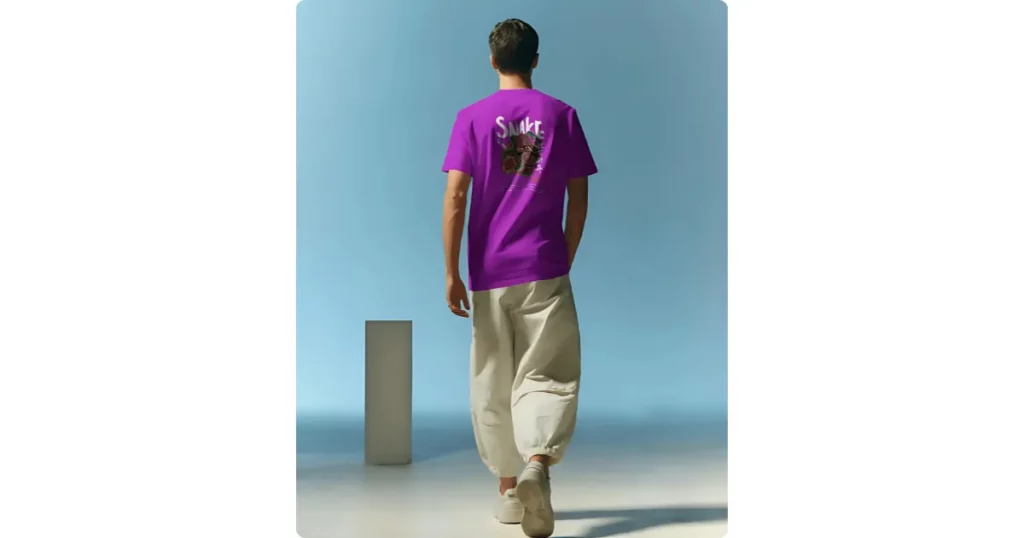 an individual wearing a t-shirt walking away