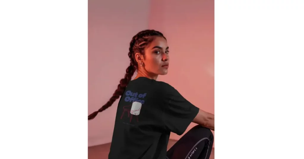 the backside of a black oversized t-shirt