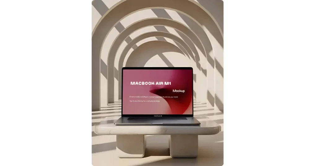 the macbook air m1 sits on a rectangular stone marble