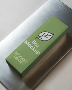 long-rectangular-box-mockup-on-brushed-metal-surface-high-gloss-reflection