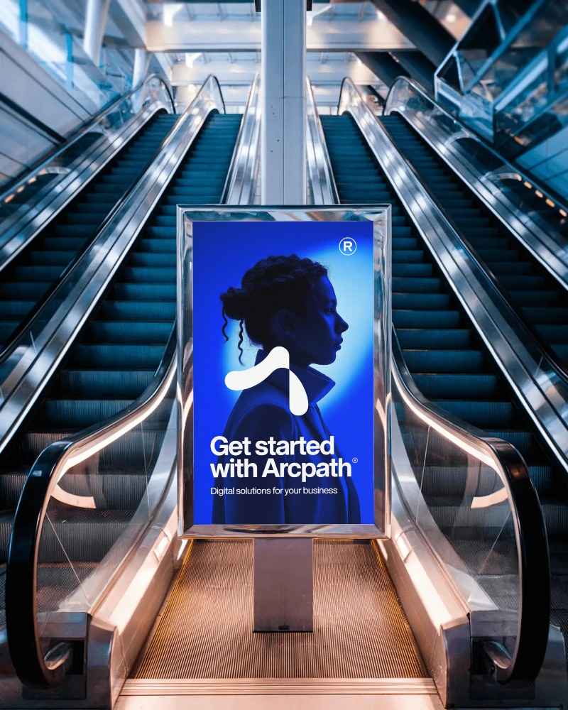 futuristic interior billboard mockup positioned between dual escalators at shopping complex









