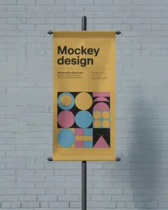 minimal street banner mockup mounted on post in front of light blue brick wall