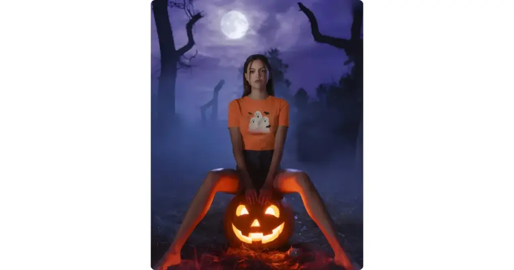 a model wearing a t-shirt surrounded by a dark forest