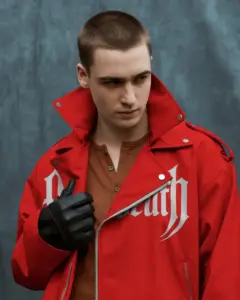 studio jacket mockup male model looking down leather style soft lighting fashion editorial