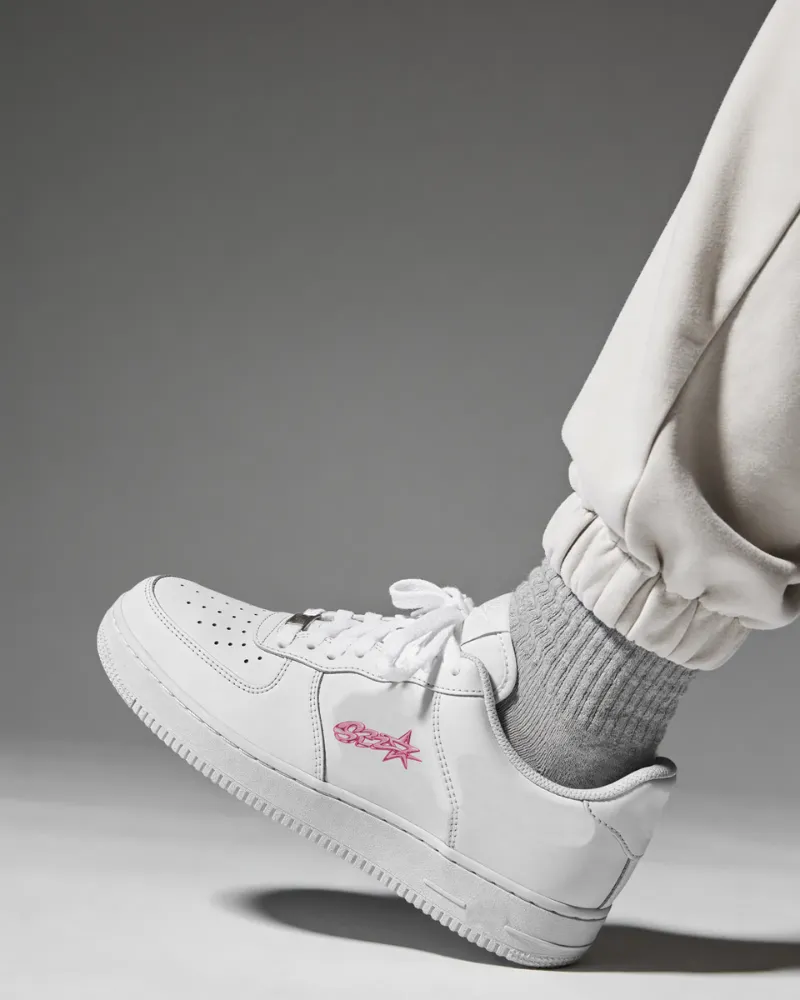 white sneaker mockup with pink graphics design